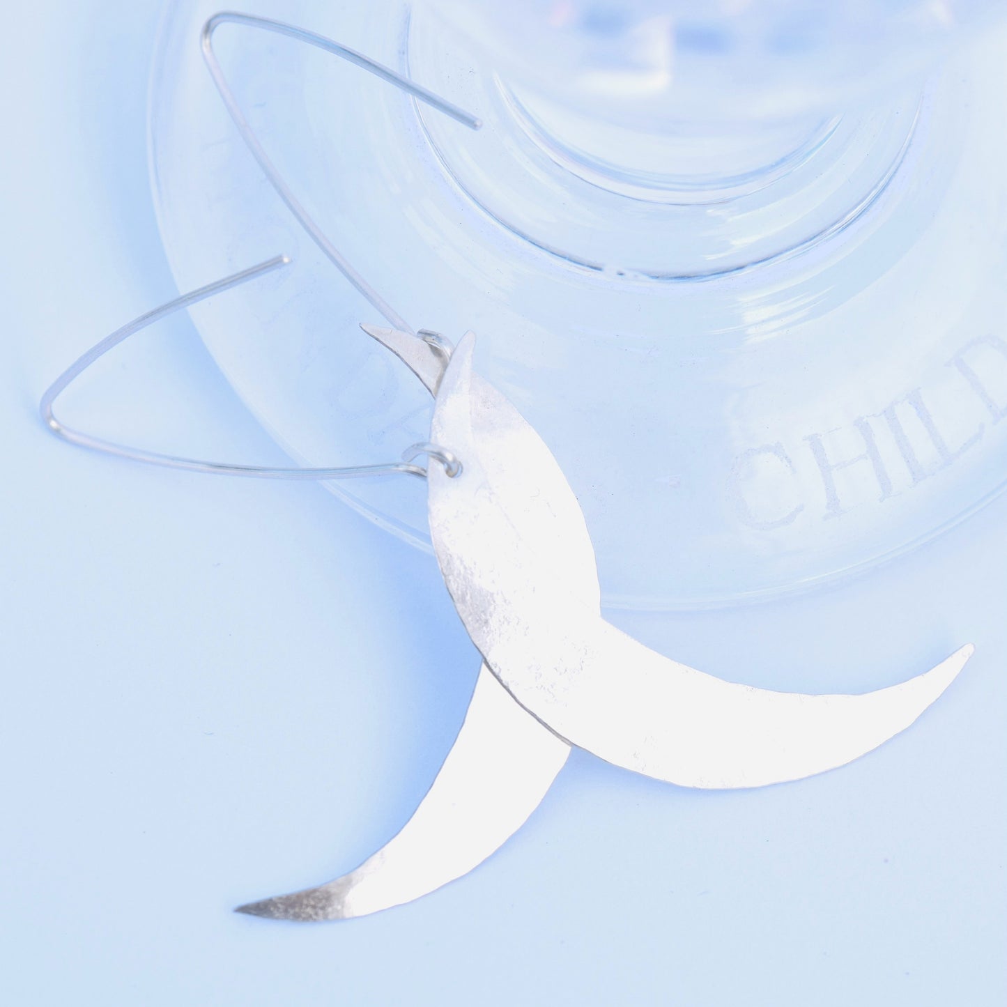 Silver crescent moon dangle earrings