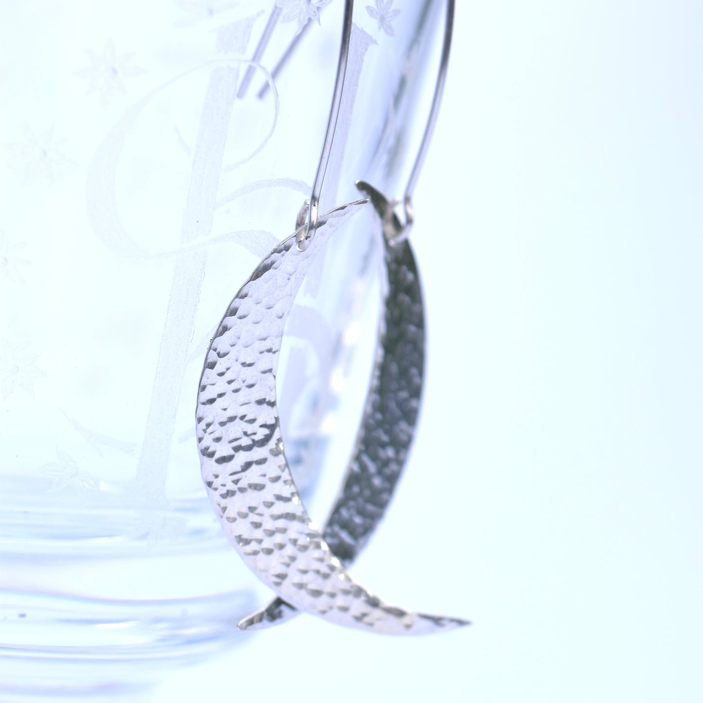 Silver crescent moon dangle earrings
