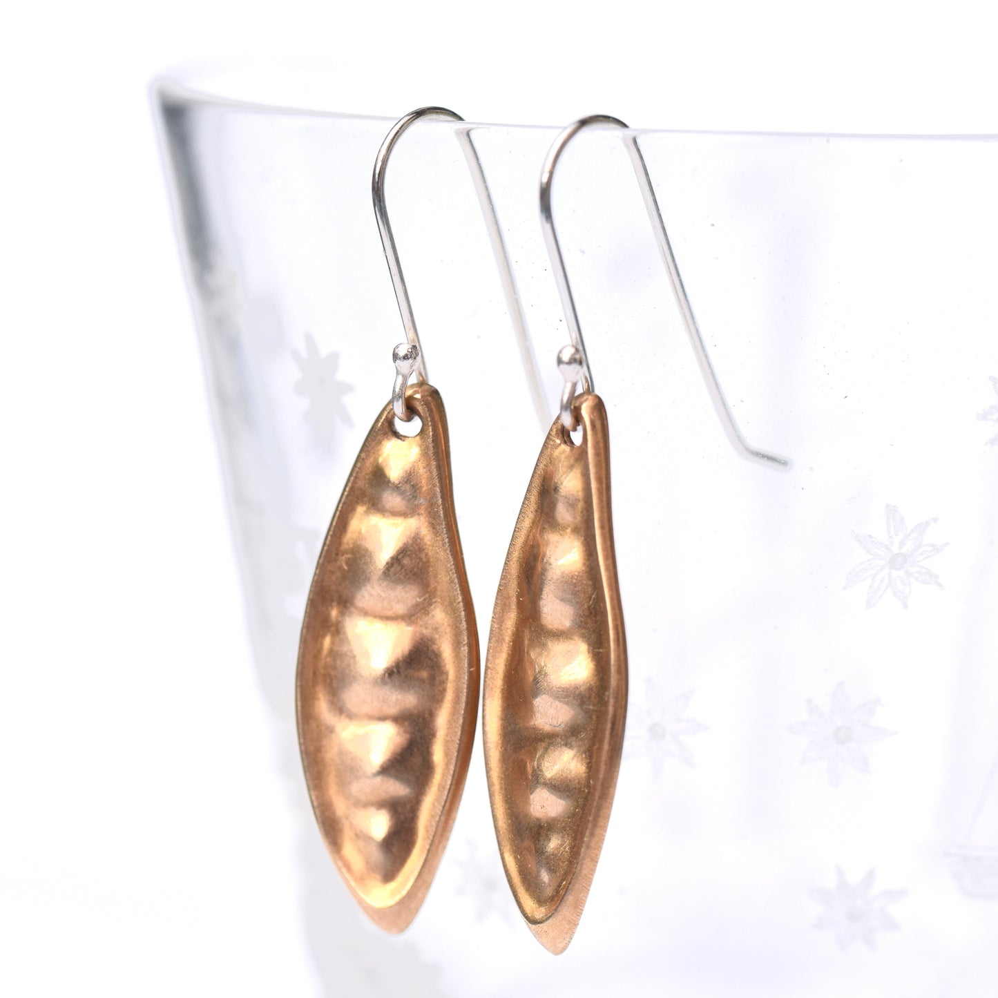 Seed pod earrings in brass