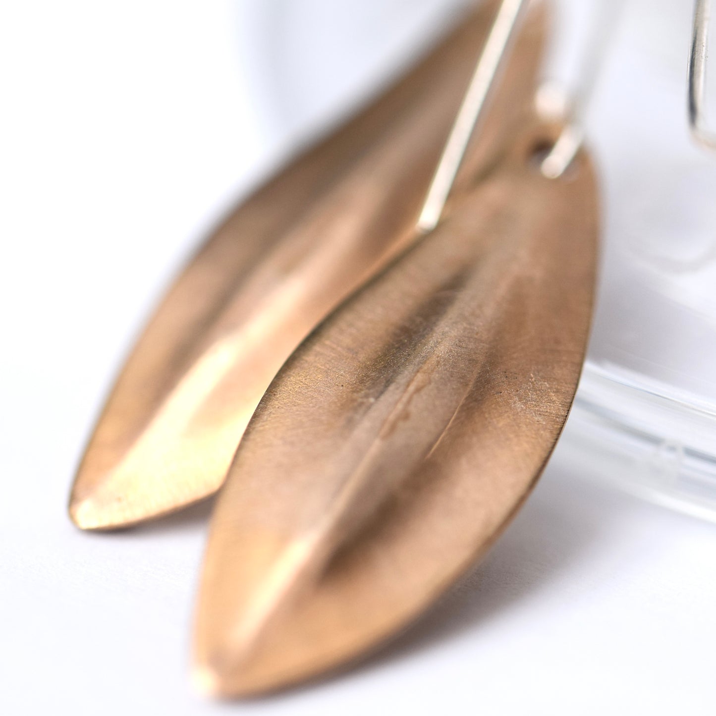 Seed pod earrings in brass